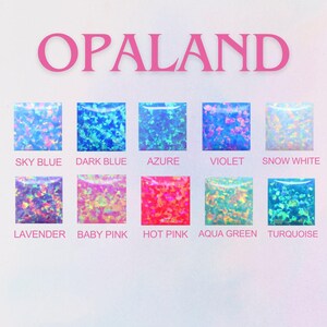 May include: A chart showing ten different colors of opal, with the name of each color written below it. The colors are: Sky Blue, Dark Blue, Azure, Violet, Snow White, Lavender, Baby Pink, Hot Pink, Aqua Green, and Turquoise.