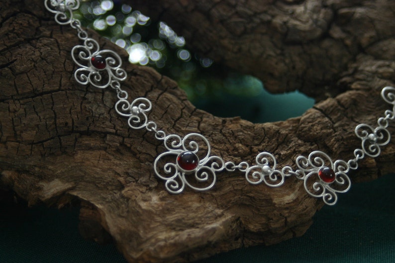 charming filigree worked necklace with deepred garnet stones loverly worked in silver image 1