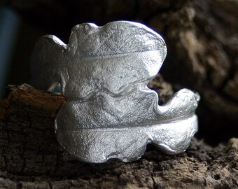 dandelion hug ring in silver