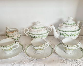 Fine porcelain coffee service, green and gold, antique