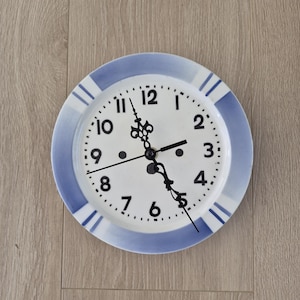 May include: A rustic wooden sign with the text "Welcome to our home" in a handwritten style. The sign features a distressed finish and a simple, inviting design, perfect for a front porch or entryway.