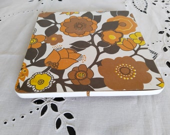 Dessous de plat en formica seventies à fleurs orange  , années 70 , vintage