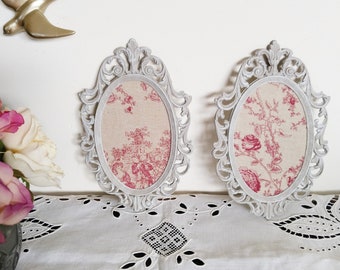 Gray patinated oval frames, pink toile de Jouy floral pattern canvas