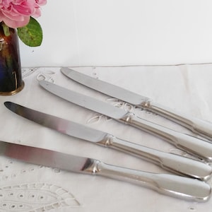 Set of 4 table knives, stainless steel blade and silver handle, vintage French