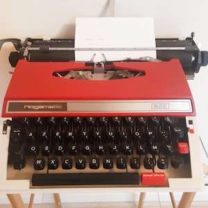 Vintage portable typewriter, red, functional, Nogamatic 800