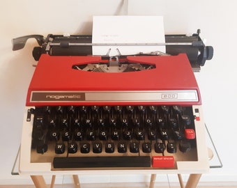 Vintage portable typewriter, red, functional, Nogamatic 800