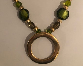 Vintage beaded Green and Gold Bold Circle statement necklace, suede, lobster claw, excellent condition