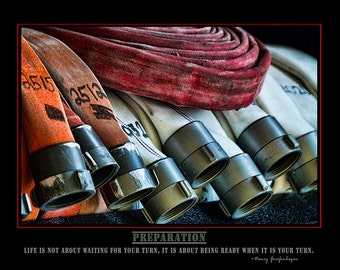May include: A motivational poster with a quote about preparation. The quote reads "Life is not about waiting for your turn, it is about being ready when it is your turn." - Nancy Greifenhagen. The image features a close-up of fire hoses, with the red hose coiled on top of the white hoses. The hoses are connected to brass nozzles.