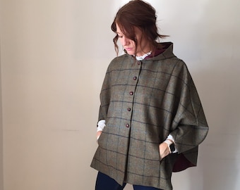 Ladies 100% Shetland wool olive green cape with red, navy and blue over check fully lined in rich red with hood 'Iris'