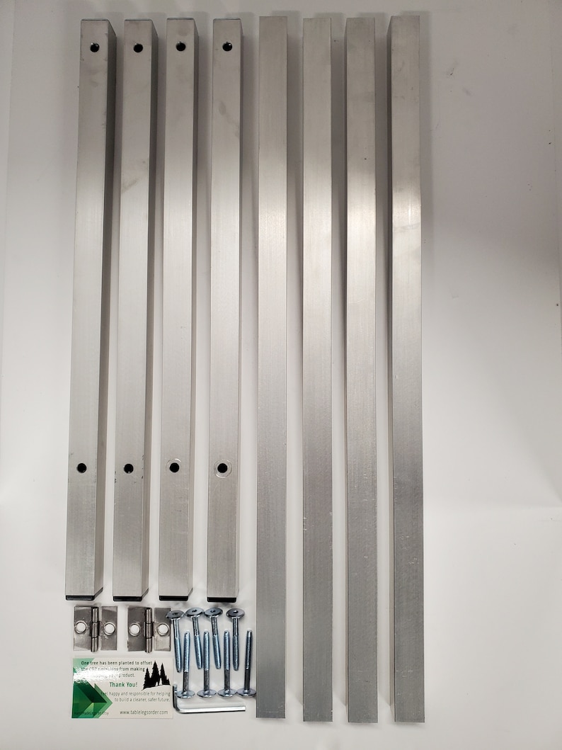 May include: Eight silver metal table legs, four silver metal hinges, and eight silver metal screws with a business card that says "Our team has been planted in efforts to help you grow. Thank you!" with a website address.