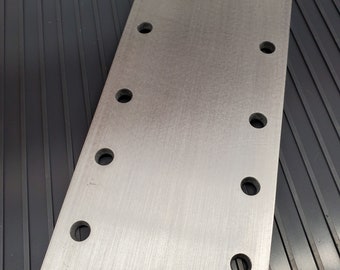 Seam plate for wooden table slabs