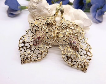 Renaissance style massive gold filigree earrings with pink crystals