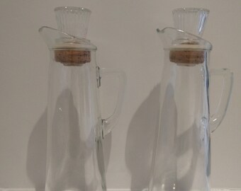 Pair of Vintage Tall Glass Bottles