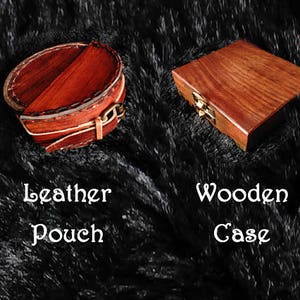 May include: Two different storage options for small items. A round, brown leather pouch with a flap and a rectangular wooden box with a brass latch. The text "Leather Pouch" and "Wooden Case" is printed below each item.