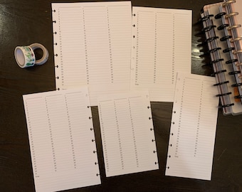 May include: White planner pages with numbered lines for daily scheduling, alongside decorative washi tape rolls featuring a cactus design. A planner with black rings is visible on the right. The pages are designed for organization and planning.