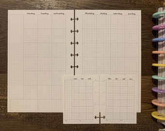 May include: A set of three white gridded paper planner pages with black text. The pages are labeled with the days of the week: Monday, Tuesday, Wednesday, Thursday, Friday, Saturday, Sunday. The pages are designed for use with a disc-bound planner.