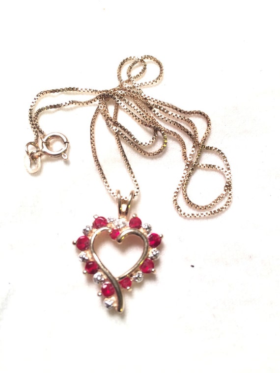 Gold over 925 sterling silver heart with red gem … - image 1