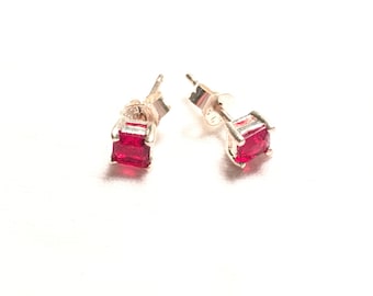 925 sterling silver earrings with red gem/stone