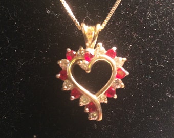 Beautiful 925 sterling silver heart with gem/stones necklace