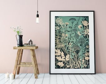 May include: A framed botanical print depicting a detailed illustration of wildflowers and foliage in teal, cream, and dark green. The artwork is presented in a black frame, adding a modern touch to the natural theme. The print is set against a soft pink wall.