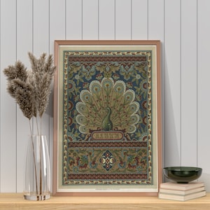 May include: A framed print of a vintage illustration of a peacock with a blue, green, and gold design. The print is surrounded by a decorative border and includes the text "Le Serpent".