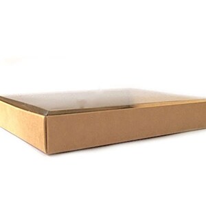 May include: A rectangular box with a clear lid and a brown base. The box is empty and sits on a white background. The box is likely used for packaging or storage.