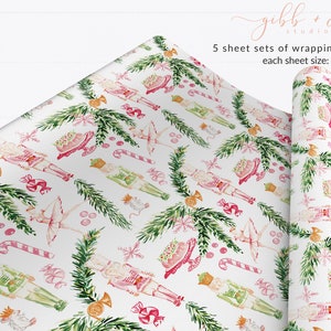May include: A set of 5 sheets of Christmas wrapping paper featuring a pink and green watercolor pattern with nutcrackers, ballerinas, candy canes, and snowflakes. Each sheet measures 20 inches by 29 inches.