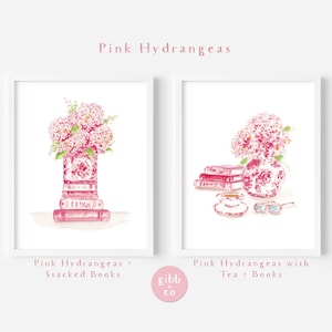 May include: Two watercolour illustrations of pink hydrangeas in a pink and white patterned vase. The first image shows the vase on top of a stack of books with the word "DESIGN" visible on one of the books. The second image shows the vase on a table with a cup of tea and glasses. Both images have the text "Pink Hydrangeas" at the top.
