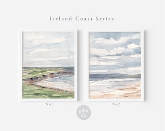 Könnte beinhalten: Zwei Aquarelle der irischen Küste. Das erste Bild zeigt eine grüne Klippe mit einem Strand und dem Meer im Hintergrund. Das zweite Bild zeigt einen Strand mit Meer und Himmel im Hintergrund. Beide Bilder haben einen weißen Rahmen und den Text "No 1" und "No 2" unter den Bildern.