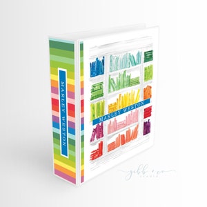 May include: A white binder with a colorful striped spine and a watercolor illustration of a bookshelf filled with rainbow-colored books. The name "MARLEY WESTON" is written in blue on the bookshelf. The binder is for school or office use.