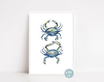 May include: Two watercolor paintings of blue crabs on a white background. The crabs are facing different directions and have a green and blue color scheme.