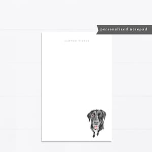 May include: A white personalized notepad with the text "SUMMER PIERCE" at the top. A watercolor illustration of a black dog is at the bottom. The notepad has the text "personalized notepad" in a banner.