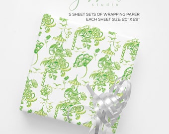 May include: A set of 5 green and white wrapping paper sheets with a pagoda and floral pattern. Each sheet measures 20 inches by 29 inches.