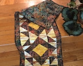 Quilted Table Runner Wall Hanging Skinny Quilt Batik Fall colors STITCHING for CHARITY