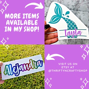 May include: Two personalized vinyl stickers, one with a mermaid tail and the name "Layla" and the other with the name "Alejandra" in rainbow colors. The stickers are on a pink background with white stars.