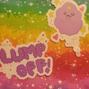 May include: Two stickers on a rainbow background. One sticker says "LUMP OFF!" in purple cloud-like letters. The other sticker is a purple cloud character with yellow stars, pink hearts, and white sprinkles.