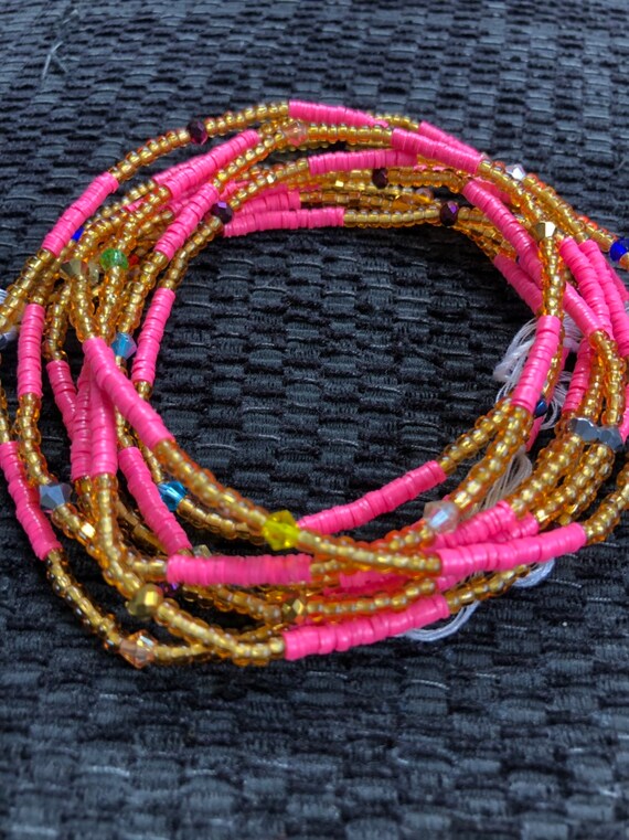 pink and gold waist beads