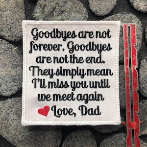 May include: White embroidered patch with black text that reads "Goodbyes are not forever. Goodbyes are not the end. They simply mean I'll miss you until we meet again. Love, Dad". A small red heart is embroidered below the text.