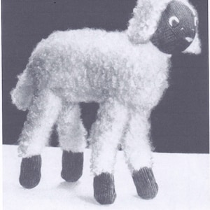 May include: A black and white knitting pattern for a Mary's Little Lamb toy. The pattern is from Bestway Leaflet No. 822 and costs 3d. The pattern is knitted from five ounces of wool.