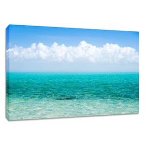Caribbean sea turquoise water photography print with blue sky and cumulus clouds.