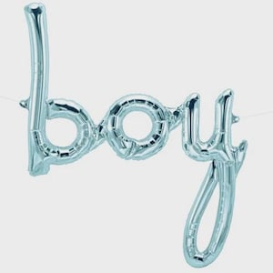 May include: A light blue foil balloon spelling out the word "boy". The balloon is suspended by a thin white string against a white background. The letters are in a cursive style.