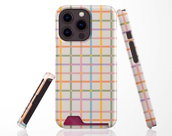 May include: A set of three phone cases with a colorful plaid pattern. The cases are white with a grid of pastel colors including pink, orange, yellow, green, and blue. One case is upright, and two are angled.