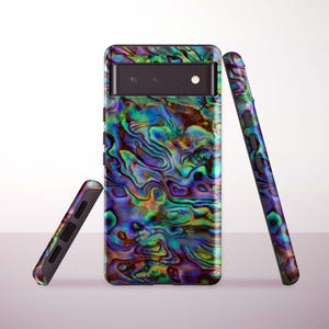 May include: A smartphone case featuring a swirling, iridescent abalone shell pattern in green, blue, and purple hues. The case is displayed in three positions, showcasing the textured surface and the phone's camera module.