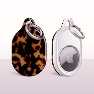 May include: A set of three ceramic mugs with a speckled, matte finish. The mugs are in shades of cream, light gray, and dark gray. Each mug has a simple, minimalist design, perfect for coffee or tea.