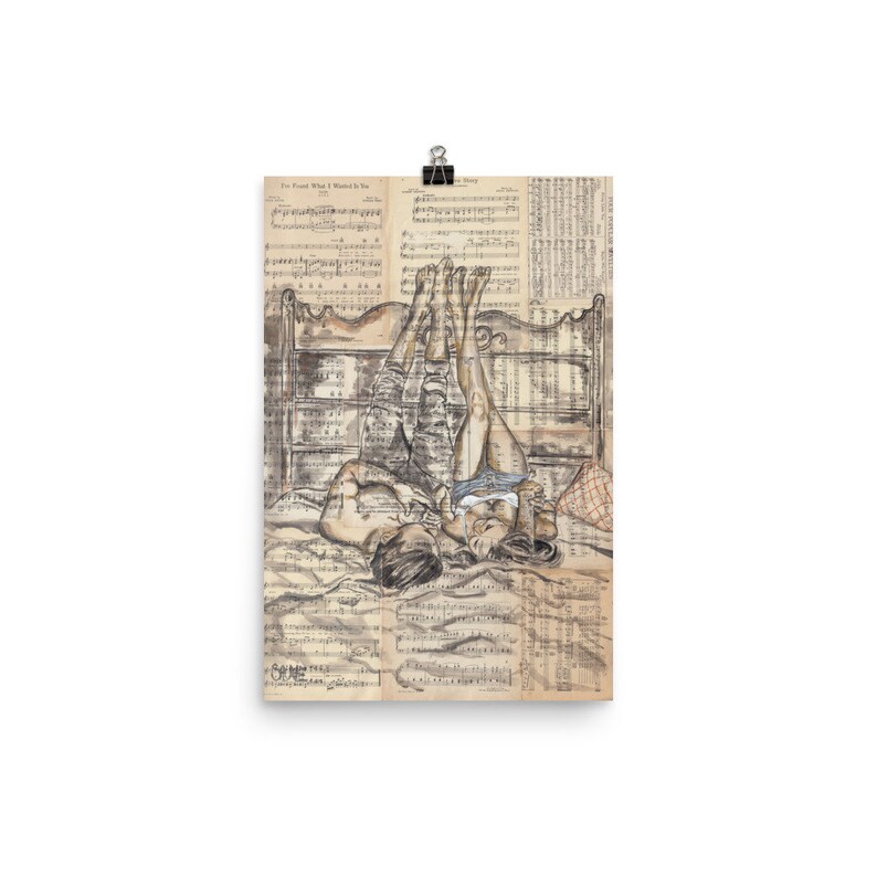 May include: A black and white illustration of a couple lying in bed, with their legs in the air. The illustration is drawn on top of a sheet of music.