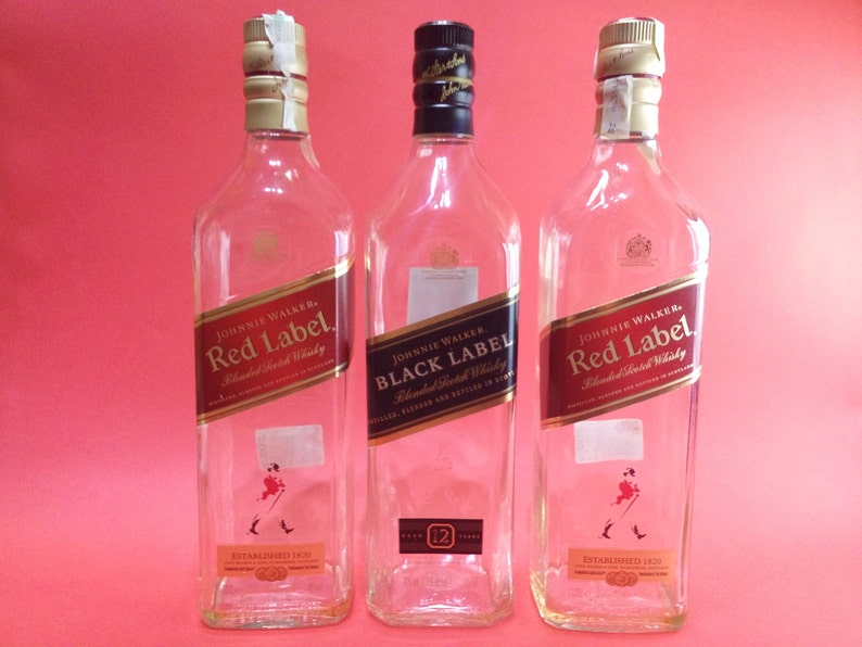 Three empty bottles of quot;Johnnie Walkerquot; 1 litter One B Three empty bottles of quot;Johnnie Walkerquot; 1 litter One B