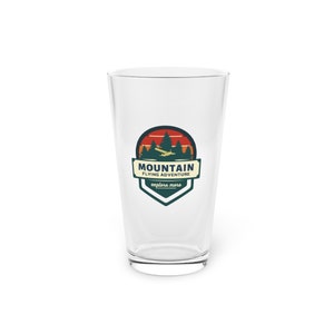 Mountain Flying Adventure Logo Pint Glass, 16oz | Pilot Barware Kitchenware | Aviation Pint Drinkware | Gift for Pilot | Hangar Decor