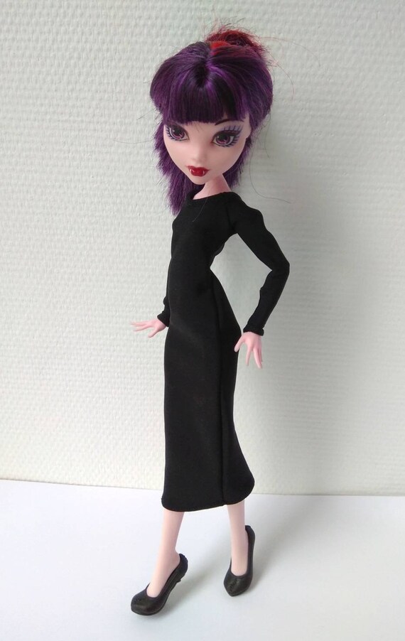 pink and black monster high doll