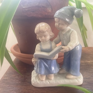 Lego Japan Figurine &quot;Girl and Boy Reading Book&quot; - hand painted porcelain enamel figurine