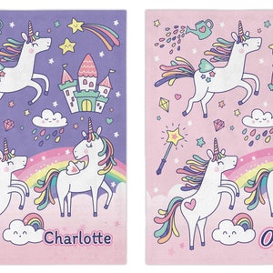 May include: Two purple and pink illustrated designs featuring unicorns, rainbows, stars, and castles. The left design says "Charlotte" and the right design says "Olivia".